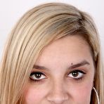 First pic of Blonde teen Zuzana sits on a stool after getting naked for the first time