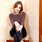 First pic of Sweet girl Doll Hole strips naked while sporting a butt plug