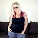 First pic of Fat chick with dyed hair does a striptease prior to interracial fucking