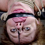 First pic of White girl Darling squirts while being fingered during extreme bondage action