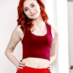 First pic of Sporty redhead Scarlet Skies squirts while being finger fucked after a fuck