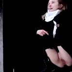 Second pic of Blonde girl Alice Klay pisses in a window frame on a winter's day