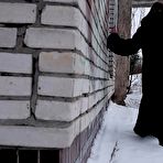 Fourth pic of Blonde girl Alice Klay pisses in a window frame on a winter's day