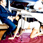 Second pic of Horny brunette wife Anissa Kate giving oral sex under table in public