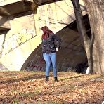 First pic of Solo girl Amanda Hill pulls down her jeans for a pee behind a tree in public