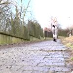 Fourth pic of Blonde girl Bianca ascends public steps before taking a badly neede pee