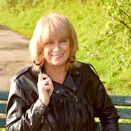 First pic of Blonde amateur Dimonty unveils her natural tits during a trip to the beach