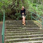 First pic of Natural redhead Chrissy Fox squats for a pee on a set of public steps