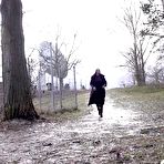 First pic of Blonde girl Bianca leans back against a tree while pissing in public