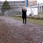 Fourth pic of Blonde girl Bianca leans back against a tree while pissing in public