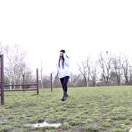 First pic of Dark-haired girl Shalina Shine takes a pee on a bench in a public field