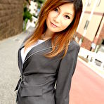 Third pic of Attractive Japanese MILF Yuria Kanno posing in public in her sexy uniform