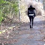 Fourth pic of Brunette chick Shalina Shine gets caught taking a piss upon wet pavement