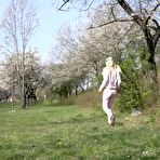 Fourth pic of Blonde girl Claudia Macc pees on firewood lengths while walking in the country