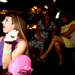 Second pic of CFNM party with a bunch of horny interracial clothed babes with big tits