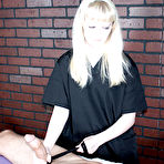 Third pic of Wicked blonde lady gives tattooed man a kinky handjob during massage