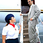 First pic of Clothed stewardesses seduce a businessman for a threesome inside a plane