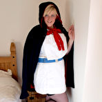 First pic of Older blonde Samantha displays her big butt prior to POV sex on a bed