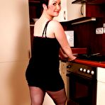 First pic of Thick lady with short brunette hair squats for a cumshot after interracial sex