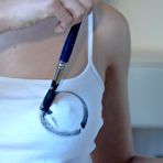 Second pic of Blonde MILF Hayley Marie Coppin unveils her great tits while painting