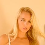 First pic of Blonde girl Hayley Marie Coppin spritzes her hot body while getting naked