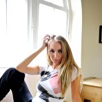 First pic of Blonde amateur Hayley Marie Coppin displays her nice tits by a window