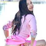 Second pic of Cute amateur Alexis shows her pussy in public during no panty upskirt action