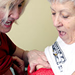 Third pic of Old lesbians suck on each others boobs after modeling fully clothed