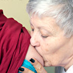 Fourth pic of Old lesbians suck on each others boobs after modeling fully clothed