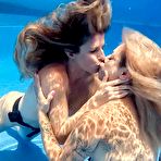 Fourth pic of Cory Chase and Lory Lace have underwater lesbian sex in a public pool