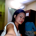 Second pic of Asian girls Irish and Leann get completely naked atop a bed