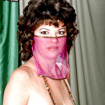 First pic of Mature Greek woman Diane Poppos letting big hanging tits fall free