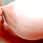 Fourth pic of Mature Greek woman Diane Poppos letting big hanging tits fall free