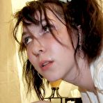 Second pic of Amateur model Little Devotchka is gagged with duct tape while bound with rope