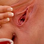 Fourth pic of Stupid slut Gracie Glam masturbating hard right at the kitchen