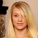 First pic of Natural blonde Teagan shows the pink of her pussy after undressing