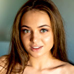 Second pic of Sweet teen Angelina doffs a bodysuit and OTK socks to pose nude on her bed