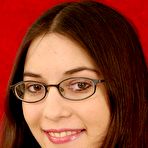 First pic of Nerdy amateur Larisa licks a knee after getting naked with her glasses on
