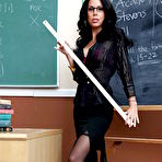 First pic of Lusty teacher MILF Tabitha Stevens takes off her panties on the table