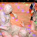 Third pic of Fully clothed european fetish chicks are into mud wrestling