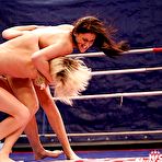 Second pic of Sporty babe are into rough catfight that turns into hot lesbian sex