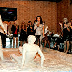 Fourth pic of Kinky fetish ladies make some fully clothed mud wrestling action