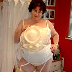 First pic of Obese woman with red hair Chris 44g sets forth her giant tits in her underwear