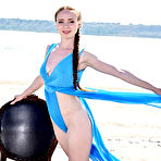 First pic of Flexible teen Stacy Redi gets completely naked on a chair at the beach