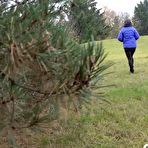 Fourth pic of White girl Naomi Benet takes a badly needed piss on the grass in public