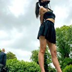 First pic of Asian chick Flawless Meow wears a neck collar with her arms bound in a park