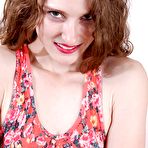 First pic of Teen first timer Tara Estell baring tiny tits and pierced cunt while disrobing