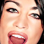 Fourth pic of Fetish Queen Mercedes sucks the cum out of a condom in a spiky collar