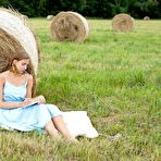 First pic of Young girls Clara Case & Oxana Chic have lesbian sex behind a round bale