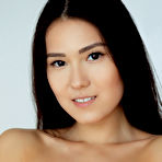 Second pic of Asian teen Kimiko peels off sexy bra and panty set to model naked on her bed